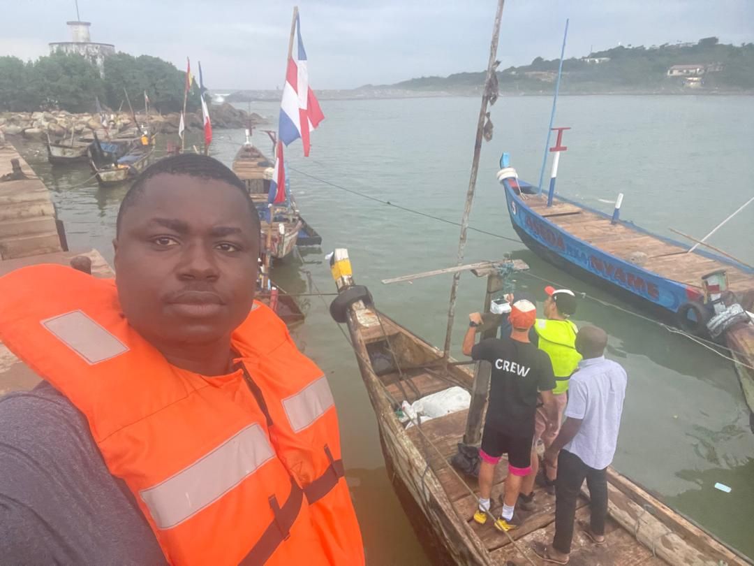 GRRMC team member in a life vest ahead of the canoe fishing expedition in Dixcove