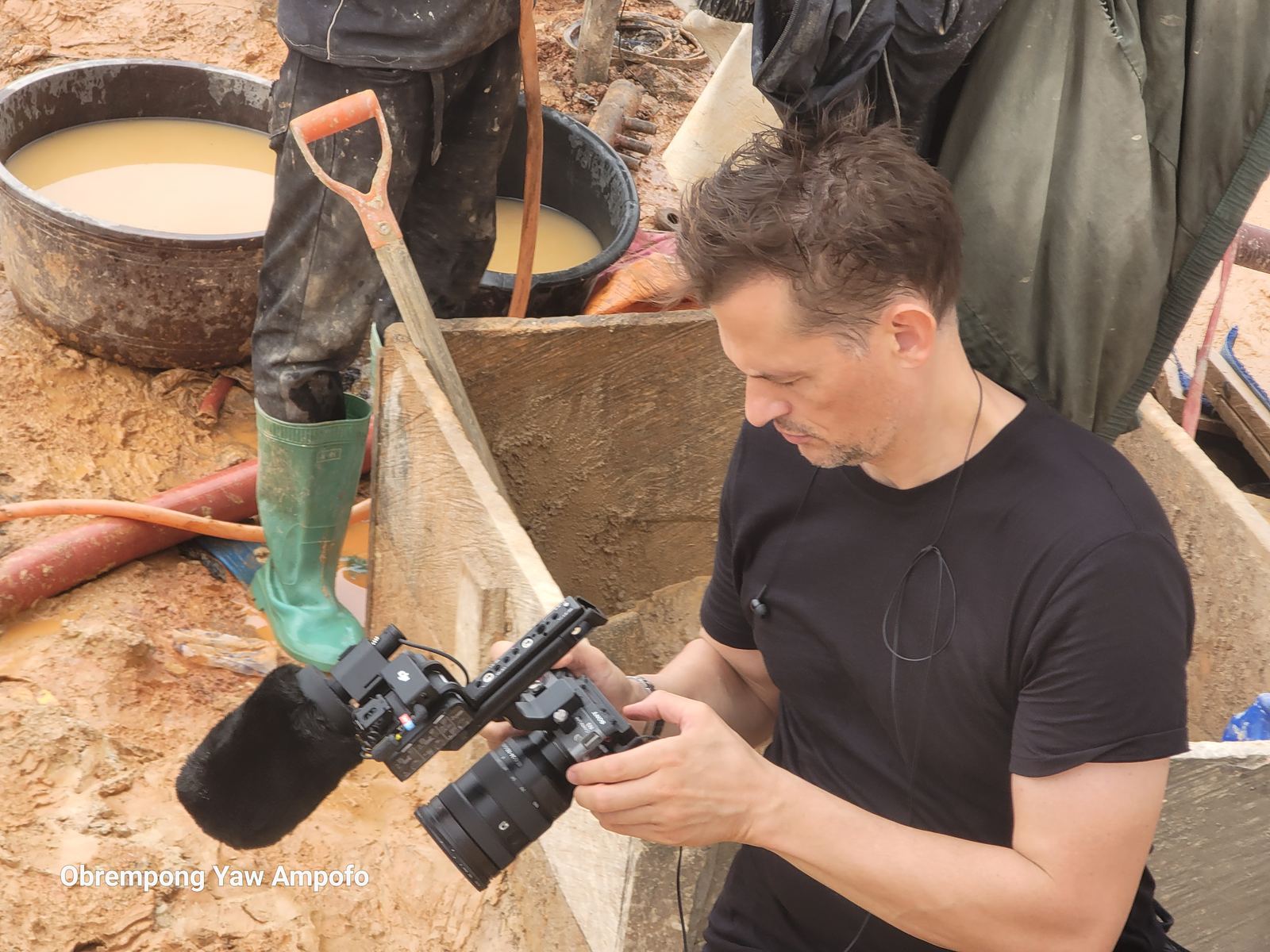 Close-up filming of ore washing at a small-scale mining site